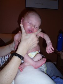 Burping Alex after using the SNS